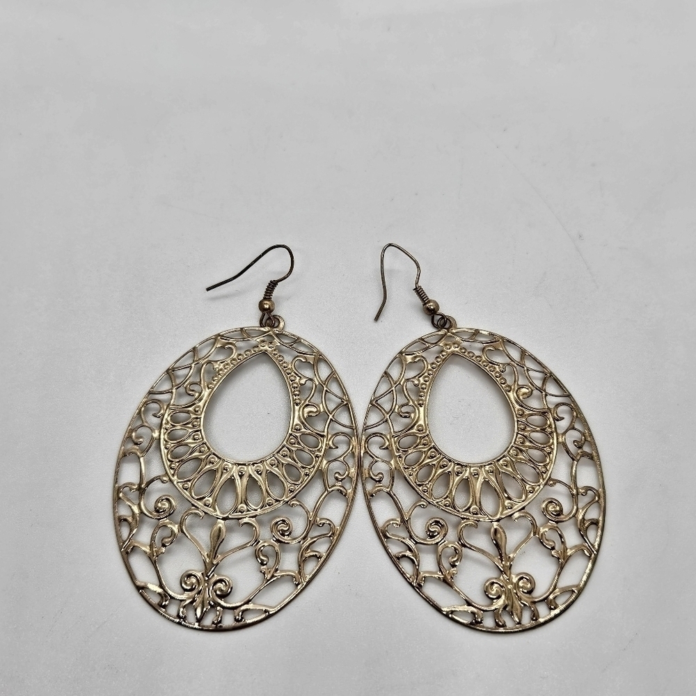 large oval gold tone cutout earrings